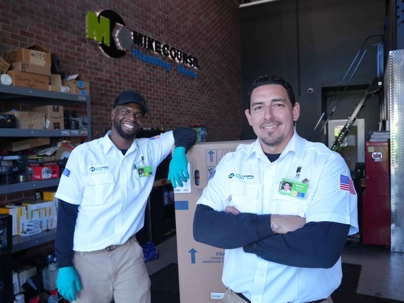 MC Plumbing team in the office