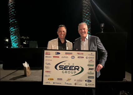 SEER execs at a conference